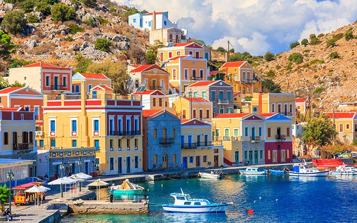 Symi with the colourful houses in the port 
